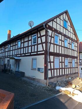 Foto - Zweifamilienhaus mit angrenzenden Landwirtschaftlichen Gebäuden