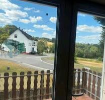 Einfamilienhaus mit Naturschiefer-Dach in Kaperich Nähe Laubach - Uersfeld