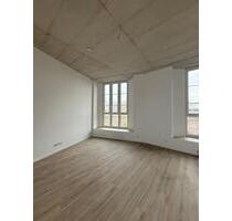 Alt trifft Neu: Kirchenraum wird Wohn(t)raum