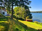 Foto - Ferienhaus mieten Hütte direkt am See Ruderboot Kamin Mecklenburg