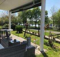 Neuwertige Erdgeschosswohnung Garten Terrasse direkt am Main - Kleinostheim
