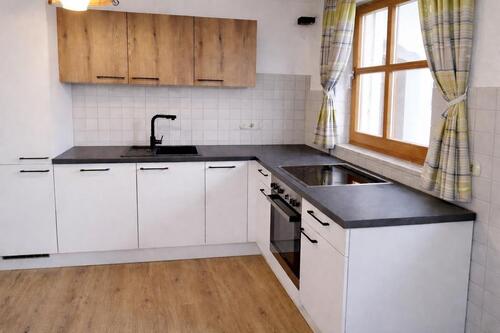 Foto - Erdgeschosswohnung mit Terrasse zu vermieten
