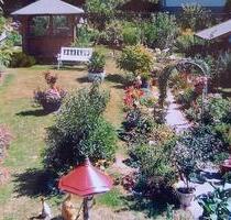 Einfamilienhaus mit schönem Garten und Wintergarten in Merzig.