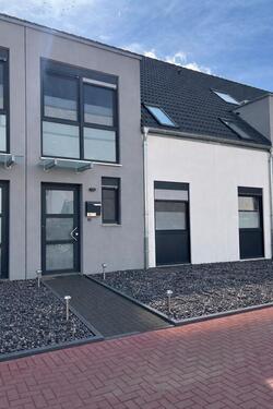 Foto - Bottrop-Kirchhellen, Neubau:Mittelreihenhaus mit Garten zur Miete