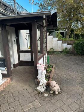 Foto - Kleine Wohnung ohne Treppen mit Terrasse und kleiner Grünfläche.
