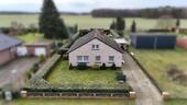 Foto - Freistehendes Einfamilienhaus mit großem Grundstück