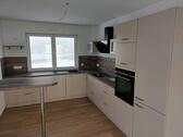 Foto - Moderne 5‑ZKB Mietwohnung, 122 m², Balkon, FBH, STP, A+ ab 1.7.26