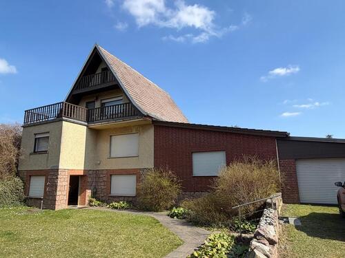 Foto - Großzügiges Einfamilienhaus mit beheiztem Indoor-Pool, Kamin