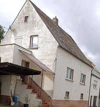 Foto - Ein Zweifamilienhaus - 135.000,00 EUR Kaufpreis,