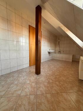 Foto - Dachgeschoßwohnung in Bitterfeld-Wolfen zur Miete