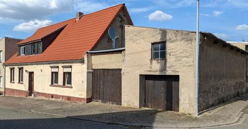 Foto - Einfamilienhaus mit Nebengelass und kleiner Werkhalle