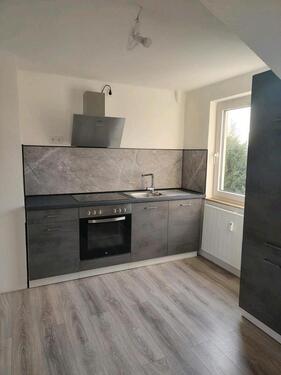 Foto - Geräumige und gepflegte Dachgeschoss-Wohnung