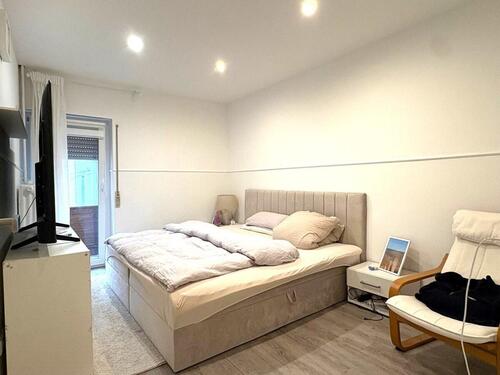 Foto - Nußloch - Großzügige Etagenwohnung in zentraler und familienfreundlicher Lage