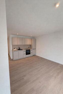 Foto - Erstbezug: 2,5-Zimmer-Wohnung mit Einbauküche, Aufzug und Garage