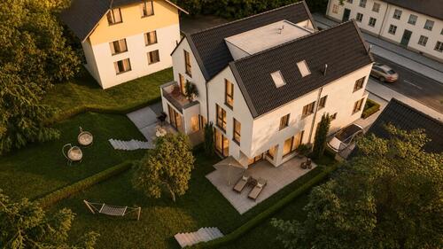 Foto - Ein Zuhause, das mit dem Leben mitwächst – modernes Neubauensembl