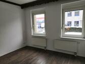 Foto - Charmante 2-Zimmer-Wohnung mit Gartenmitbenutzung im Erdgeschoss