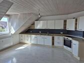 Foto - Helle 4 Zimmer Wohnung mit EBK, Garten, und Garage
