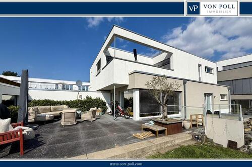 Foto - Moderne Erdgeschoss- Wohnung mit Terrasse und Gartenanteil