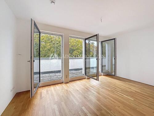 Foto - Stilvolle Dachgeschosswohnung mit Einbauküche, Aufzug und großer Rundum-Terrasse in begehrter Lage