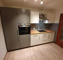 Moderne 2-Zimmer-Dachgeschosswohnung mit Einbauküche und Balkon - zentral gelegen in Gunzenhausen