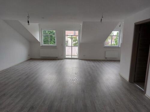 Foto - Große Dachgeschosswohnung mit offener Raumstruktur