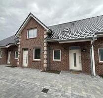 Erstbezug, moderne Obergeschosswohnung mit Balkon und Carport in Westoverledingen - Flachsmeer