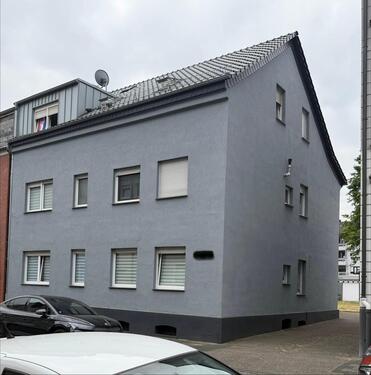 Foto - Gepflegtes Mehrfamilienhaus mit großem Garten und Garagen