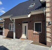 Vermietung: Erstbezug, moderne Erdgeschosswohnung mit Terrasse und Carport in Westoverledingen