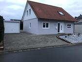 Foto - Einfamilienhaus in Korbach – Erdwärme, Südterrasse, Garage