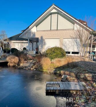 Foto - Walmdachbungalow mit Einliegerwohnung in Luxuslage