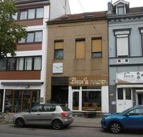 Mehrfamilienhaus mit 3 Wohneinheiten Ladenlokal in Bremen