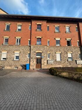 Foto - 2-Zimmer Wohnung mit Kaminofen, Küche & Carport – zentrale Lage