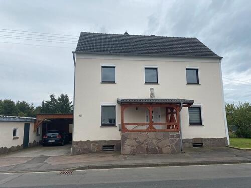 Foto - Einfamilienhaus mit Einliegerwohnung