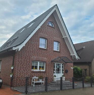 Foto - Einfamilienhaus mit Einliegerwohnung