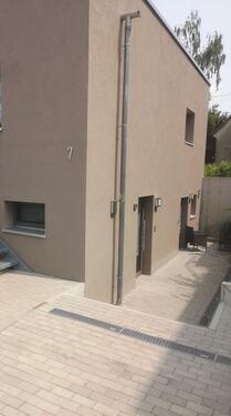 Foto - Moderne 1-Zimmer Tiefpaterre Wohnung Küche Bad