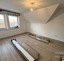 Beckum-Vellern - frisch renovierte DG Wohnung 2 ZKB mit Fußbodenheizung 35m²