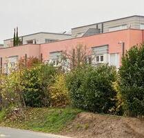 Reihenhaus im Penthouse-Stil in Kleinostheim mit Dachterrasse.