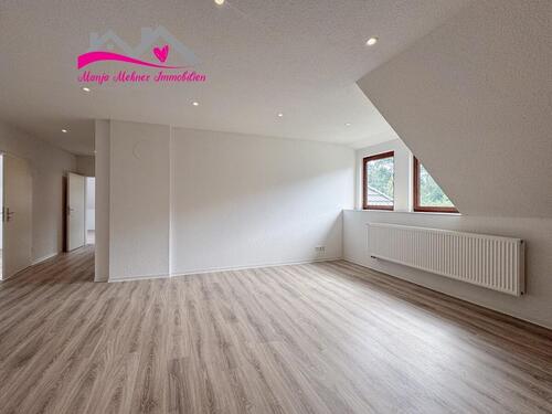 Foto - Familienfreundliche 4-Zimmer-Dachgeschosswohnung mit Gartennutzung