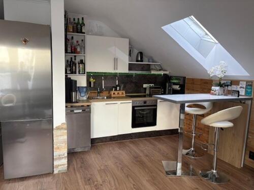 Foto - Helle, vollmöblierte DG-Wohnung in zentraler, ruhiger Lage von WI