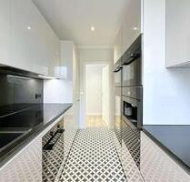 Hochwertig sanierte 3-Zimmer-Wohnung mit exklusiver Einbauküche und Südbalkon - Papendorf