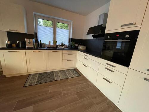 Foto - Moderne Erdgeschosswohnung mit Küche und Garten!