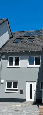 Foto - Neubau-Reihenmittelhaus in City-Lage