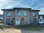 Foto - Moderne Neubauwohnung in Versmold – 2 Zimmer, Balkon & Parkplatz