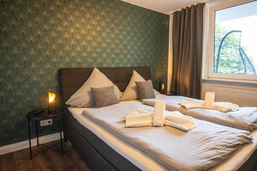 Foto - Voll möbliertes 2 12 Zimmer Apartment mit Balkon und High-Speed-Internet