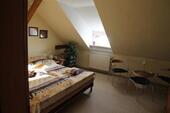 Foto - Dreizimmerdachgeschosswohnung mit eigenem Kamin im Wohnzimmer