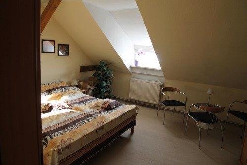 Foto - Dreizimmerdachgeschosswohnung mit eigenem Kamin im Wohnzimmer