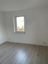 Foto - Familienfreundliche 4-Zimmer-Maisonette-Wohnung mit Garten