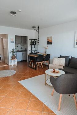 Foto - Ferienwohnung Rügen Wasserblick Garten Terrasse Boot