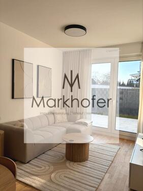 Foto - Teilmöbilierte Neubau - Erdgeschoss- Wohnung mit 2 Zimmern und Terrasse zu vermieten !