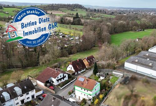 Foto - DIETZ: Kernsanierte 3-Zimmer-Wohnung in Feldrandlage von Unter-Schweinheim! Inkl. neuer Einbauküche!